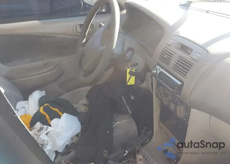 1998 Toyota Corolla Ce z USA, uszkodzony, nr VIN 2T1BR12E8WC096634